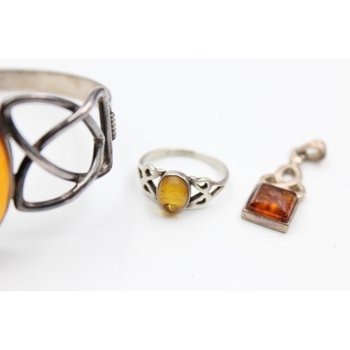 2193 - Three pieces of .925 silver amber jewellery - approx. gross weight 26 grams