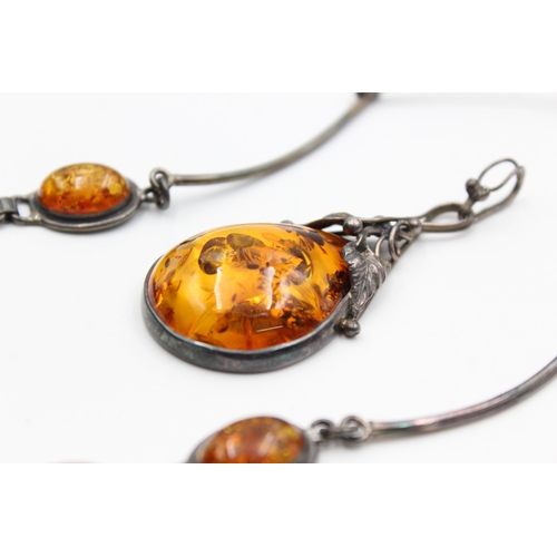 2196 - Two pieces of Modernist .925 silver amber jewellery, one necklace and one bracelet - approx. gross w... 