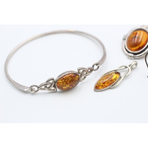 2204 - Six pieces of .925 silver amber jewellery - approx. gross weight 21 grams