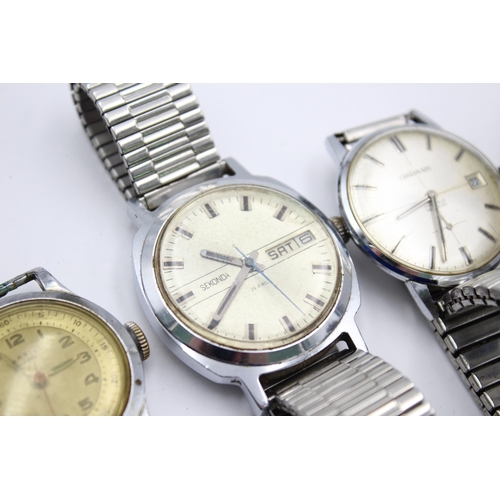 2230 - Four vintage men's wristwatches to include Timex, Sekonda etc.