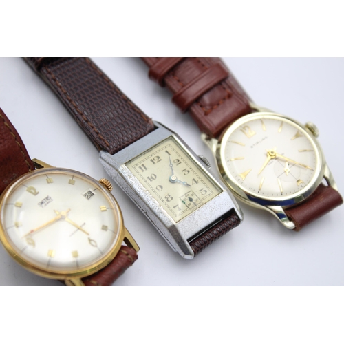 2237 - Four vintage men's wristwatches to include Smiths Empire etc.