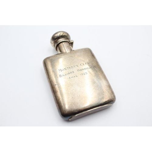 2284 - A stamped .800 silver gent's hip flask with engraving - approx. gross weight 73 grams and 11cm high ... 