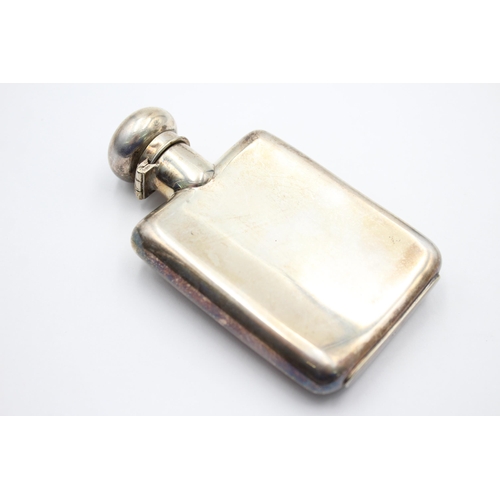 2284 - A stamped .800 silver gent's hip flask with engraving - approx. gross weight 73 grams and 11cm high ... 