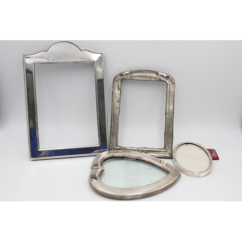 2294 - Four hallmarked sterling silver photograph frames - approx. gross weight 459 grams