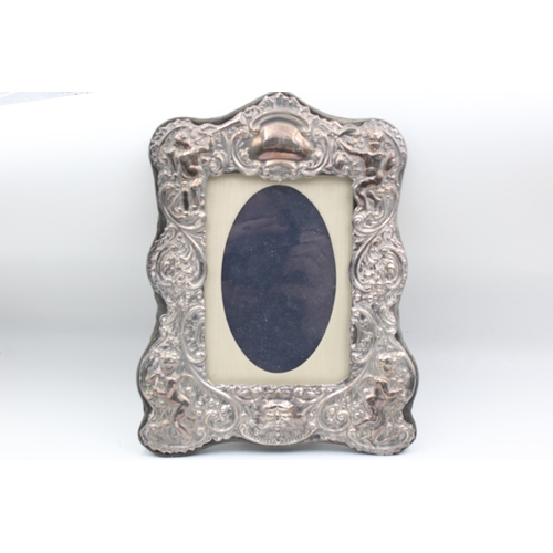 2300 - Two hallmarked sterling silver photograph frames - approx. gross weight 637 grams