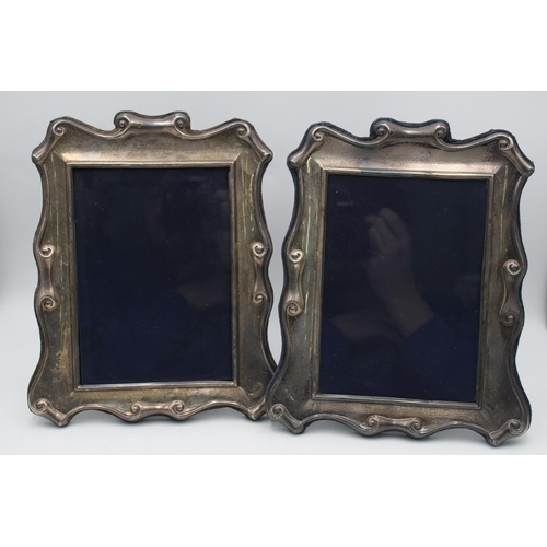 2302 - A pair of R. Carr hallmarked sterling silver photograph frames - approx. gross weight 1233 grams and... 