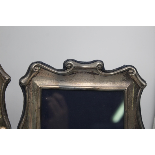 2302 - A pair of R. Carr hallmarked sterling silver photograph frames - approx. gross weight 1233 grams and... 