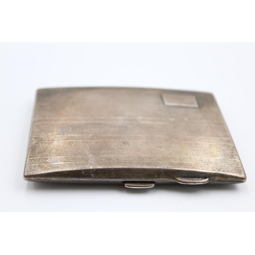 2310 - A Samuel M Levi hallmarked Birmingham silver cigarette case, dated 1934 - approx. gross weight 76 gr... 