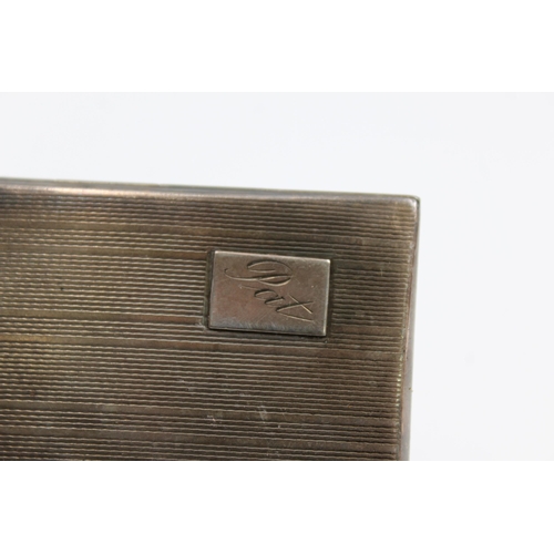 2310 - A Samuel M Levi hallmarked Birmingham silver cigarette case, dated 1934 - approx. gross weight 76 gr... 