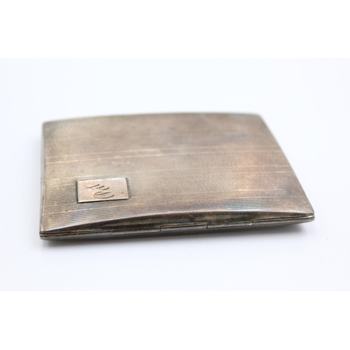 2310 - A Samuel M Levi hallmarked Birmingham silver cigarette case, dated 1934 - approx. gross weight 76 gr... 