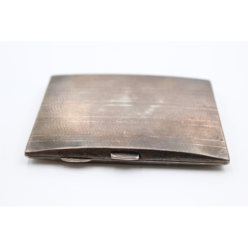 2310 - A Samuel M Levi hallmarked Birmingham silver cigarette case, dated 1934 - approx. gross weight 76 gr... 