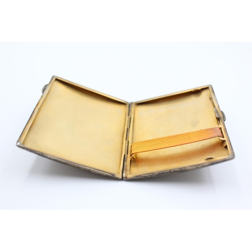 2310 - A Samuel M Levi hallmarked Birmingham silver cigarette case, dated 1934 - approx. gross weight 76 gr... 