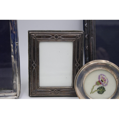 2318 - Four hallmarked sterling silver photograph frames - approx. gross weight 565 grams