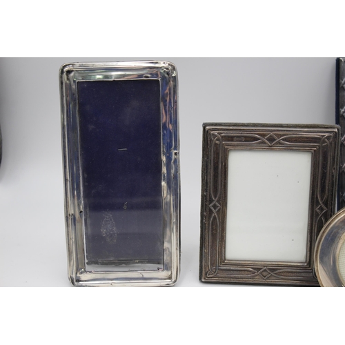 2318 - Four hallmarked sterling silver photograph frames - approx. gross weight 565 grams