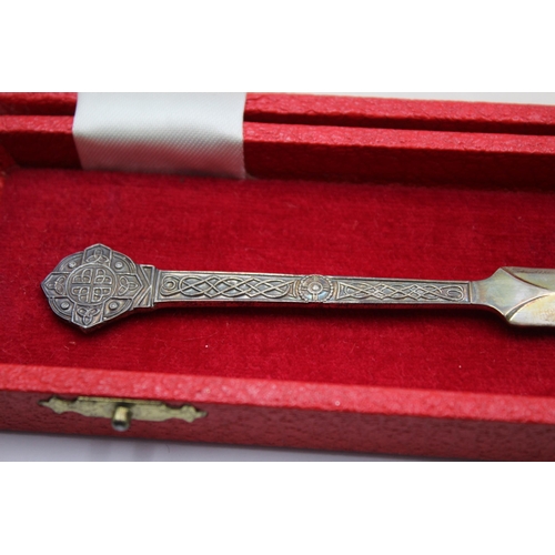 2319 - A boxed Cooper Brothers & Sons hallmarked Sheffield silver Celtic letter opener, dated 1973 - approx... 