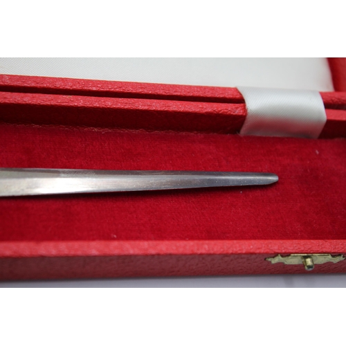 2319 - A boxed Cooper Brothers & Sons hallmarked Sheffield silver Celtic letter opener, dated 1973 - approx... 