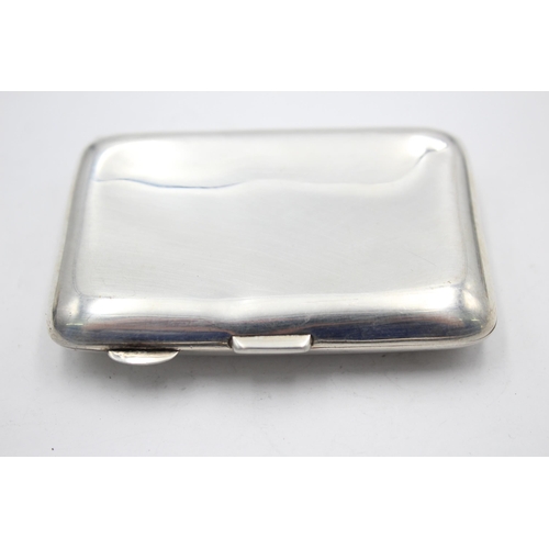 2322 - A William Neale & Sons Ltd hallmarked Birmingham silver cigarette case, dated 1922 - approx. gross w... 