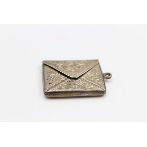 2330 - A George V hallmarked Chester silver stamp case pendant, dated 1912 - approx. gross weight 3 grams a... 