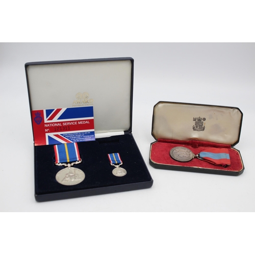 2331 - Two boxed medals, one National Service with miniature and one Elizabeth II Imperial Service