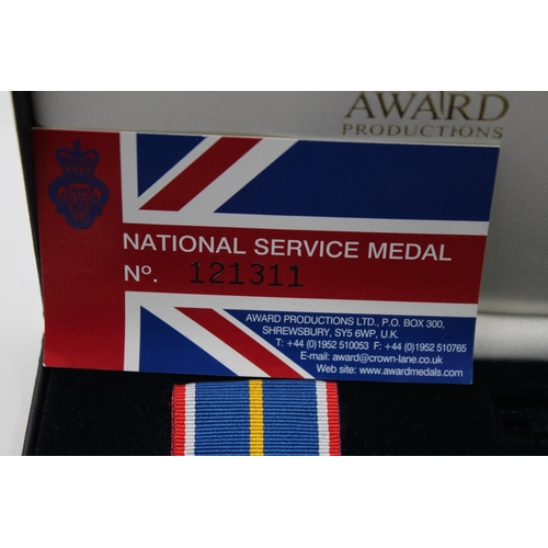 2331 - Two boxed medals, one National Service with miniature and one Elizabeth II Imperial Service