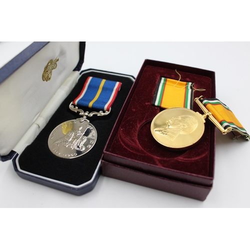 2335 - Two boxed medals, one National Service and one Jordan Service