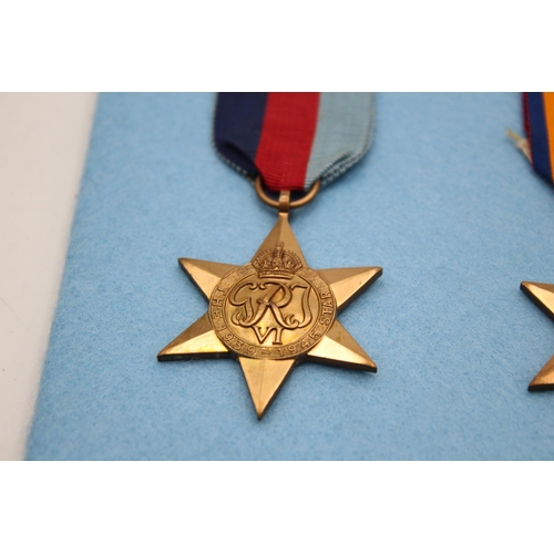 2338 - A WWII mounted medal group to include Burma Star, France & Germany Star etc.