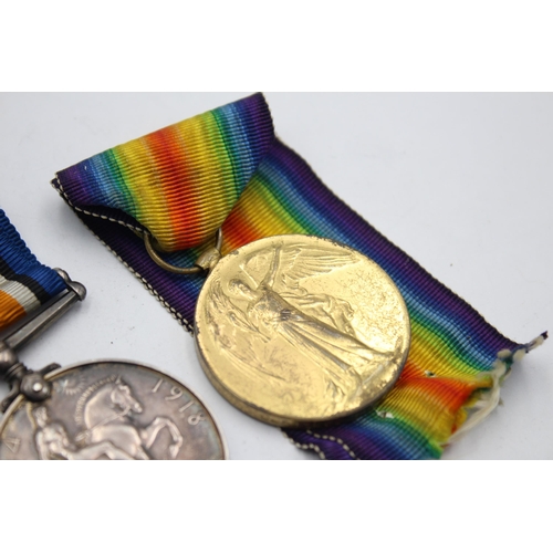 2344 - A WWI medal pair with original ribbons presented to R-311456 PTE P. Mayes A.S.C