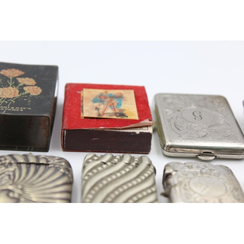 2361 - A collection of tobacciana to include vesta cases, snuff box etc.