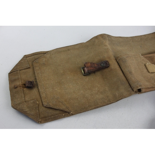 495 - A WWII era canvas rifle case and cleaning kit, case marked A.M.C44 and kit dated 1945