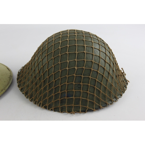 499 - Two vintage military steel helmets