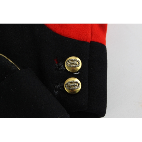 501 - A vintage British military officer's mess dress uniform comprising waistcoat, tunic, trousers and ca... 