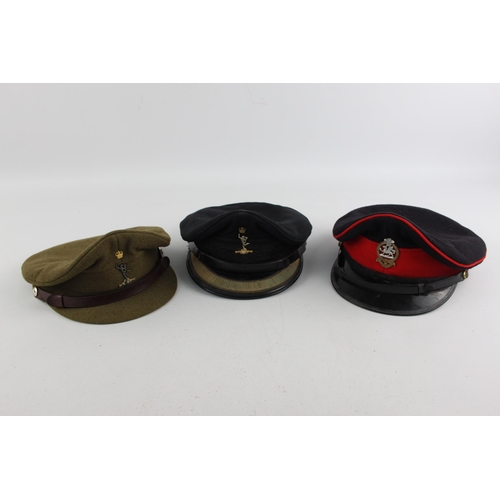 502 - Three British military peaked caps to include Royal Signallers, Queens etc.