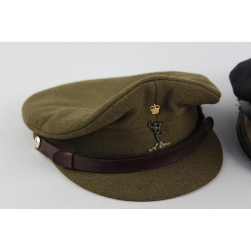 502 - Three British military peaked caps to include Royal Signallers, Queens etc.