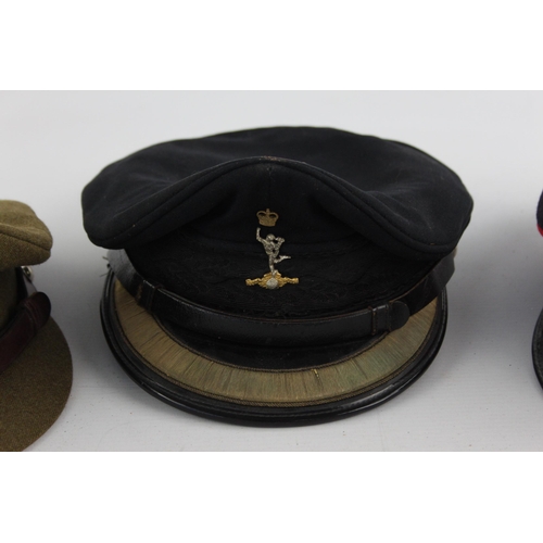 502 - Three British military peaked caps to include Royal Signallers, Queens etc.