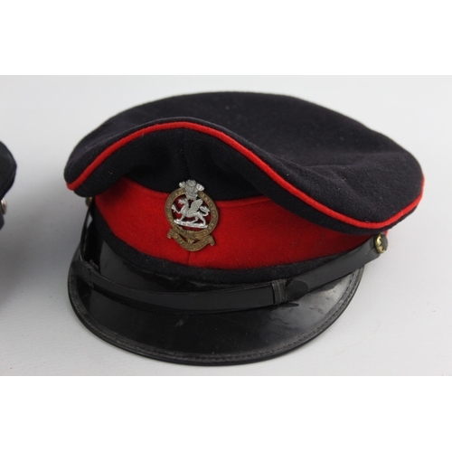 502 - Three British military peaked caps to include Royal Signallers, Queens etc.