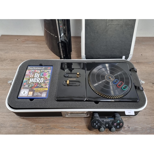 556 - A Sony PlayStation 3 CECHC03 backwards compatible games console with cased DJ HERO RENEGADE PS2/PS3 ... 