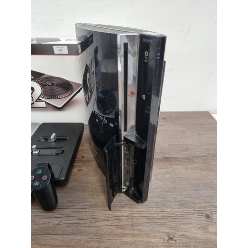 559 - A Sony PlayStation 3 CECHCO3 backwards compatible games console with wireless controller and boxed D... 