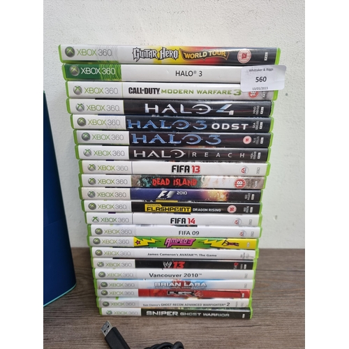 560 - A Microsoft Xbox 360 E limited edition blue 024008743908 games console with controllers and twenty o... 