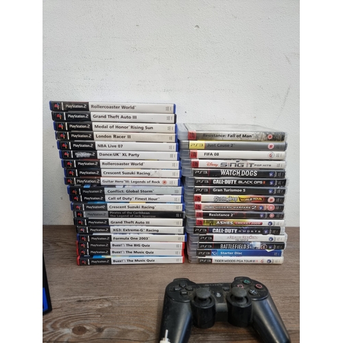 580 - Four Sony PlayStation games consoles, one PS One, one PS2, one PlayStation and one PS3 with accessor... 