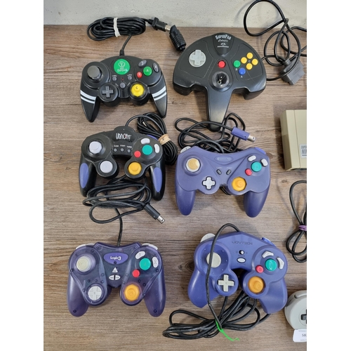 583 - Seven Nintendo controllers to include N64, GameCube and SNES