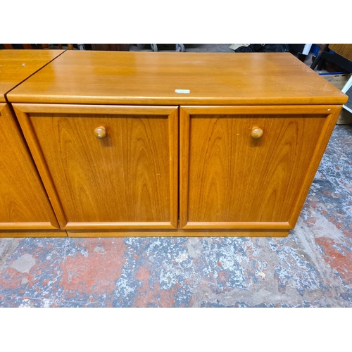 173 - A pair of 1970s G Plan teak two door cabinets with internal shelves - approx. 58cm high x 87cm wide ... 