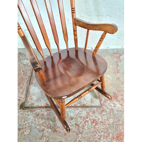 175 - A Victorian style stained beech farmhouse rocking chair - approx. 100cm high x 57cm wide x 46cm deep