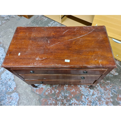 187 - An early 20th century oak chest of three drawers - approx. 82cm high x 91cm wide x 45cm deep