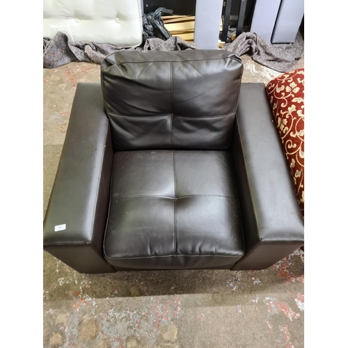 189 - A modern brown leatherette armchair