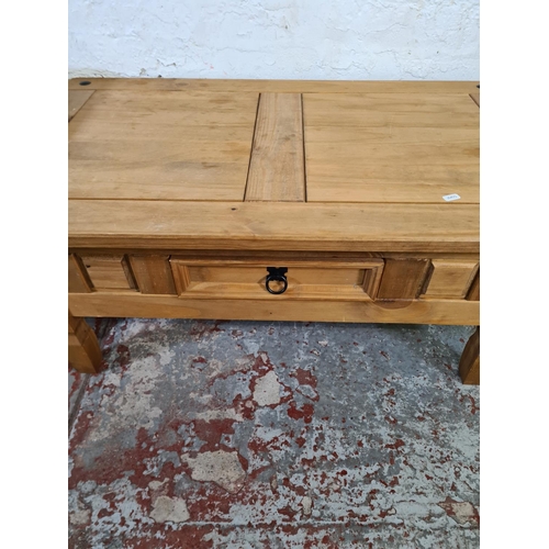 207 - Two pieces of Mexican pine furniture, one TV stand and one rectangular coffee table