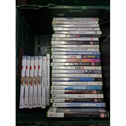 594 - Three Microsoft Xbox 360 games consoles with games