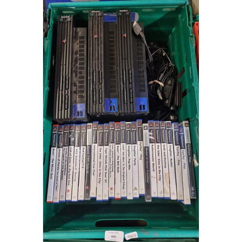600 - Three Sony PlayStation 2 games consoles with accessories and games