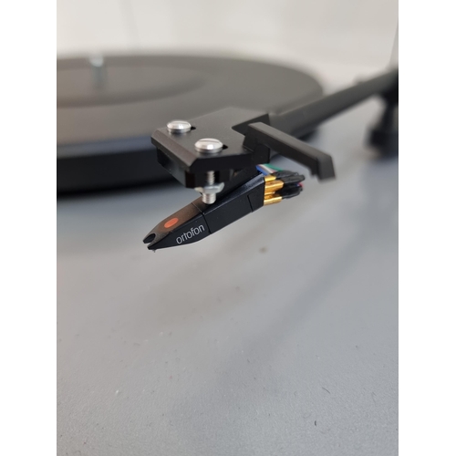 670 - A Pro-Ject audio systems Debut turntable fitted with Ortofon OMB cartridge