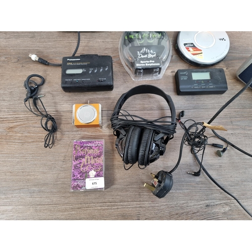 675 - A collection of items to include Sony D-EJ011 CD Walkman, JVC headphones, Sony SRS-P3 personal stere... 