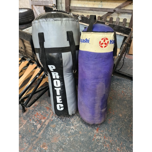 816 - Two punching bags, one Protec and one Hayashi